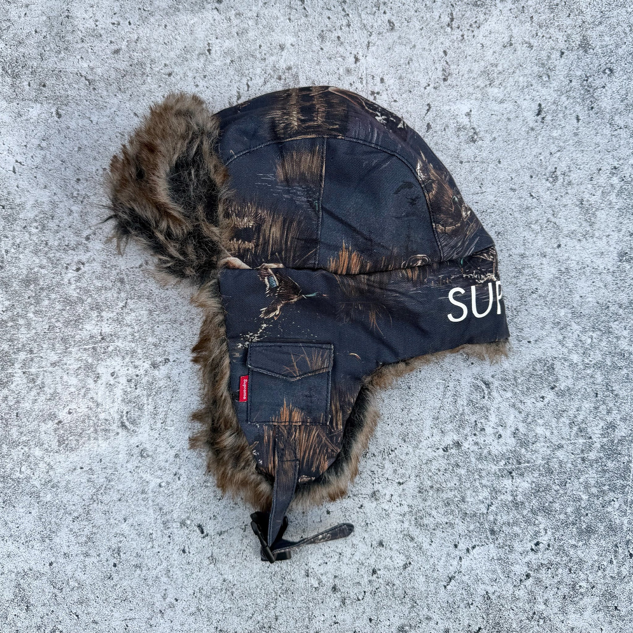 Supreme Dogs & Ducks Trooper Hat